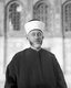Haj Mohammed Effendi Amin el-Husseini (Arabic: محمد أمين الحسيني‎, Muhammad Amin al-Husayni; born between 1895 and 1897; died July 4, 1974) was a Palestinian Arab nationalist and Muslim leader in the Mandatory Palestine.<br/><br/>

Al-Husseini was an Arab nationalist and following the end of the First World War positioned himself in Damascus, as a supporter of the Arab Kingdom of Syria. However, following the fiasco of the Franco-Syrian War, his positions on pan-Arabism shifted to a form of local nationalism for the Arabs of Palestine and he moved back to Jerusalem. From 1921 to 1937 al-Husseini was the Grand Mufti of Jerusalem, using the position to promote Islam and rally Arab nationalism against Zionism.<br/><br/>

During the 1948 Palestine War, Husseini represented the Arab Higher Committee and opposed both the 1947 UN Partition Plan and King Abdullah's entente with Zionists to annex the Arab part of British Mandatory Palestine to Jordan. In September 1948, he participated in the establishment of an All-Palestine Government. Seated in Egyptian ruled Gaza, this government won a limited recognition of Arab states, but was eventually dissolved by Gamal Nasser in 1959.